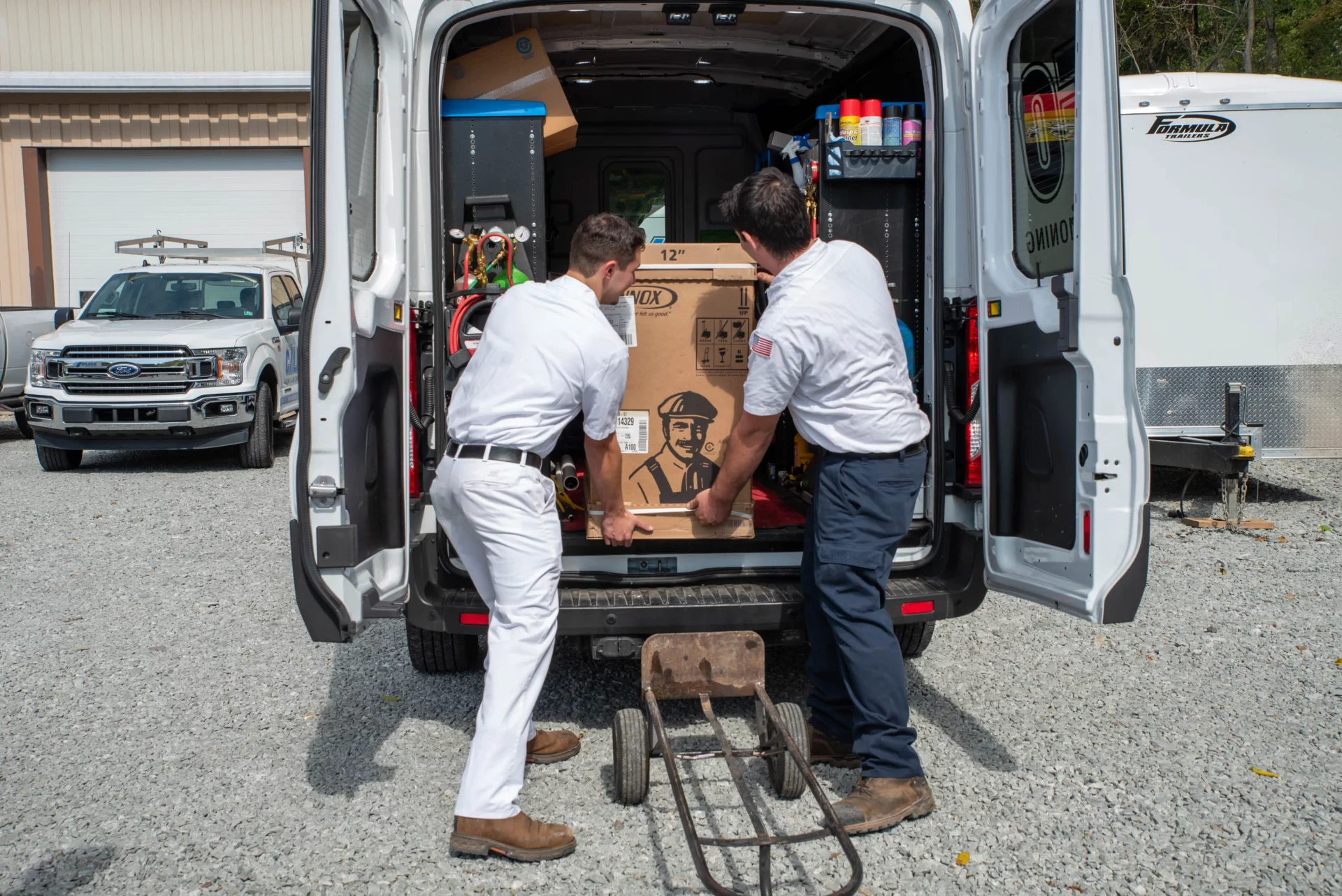 calfo employees loading equipment and product into company vehicle in pittsburgh pa