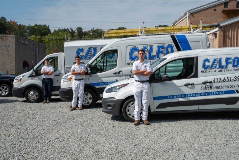 three calfo employees with company vehicles in pittsburgh pa