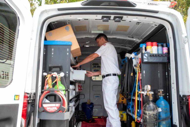 calfo employee preparing for boiler repair in company vehicle